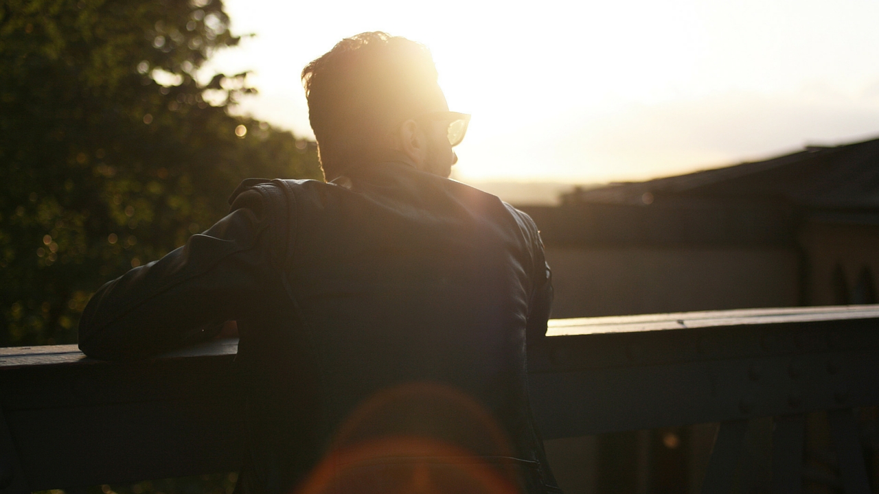 Man Looking at Sunset